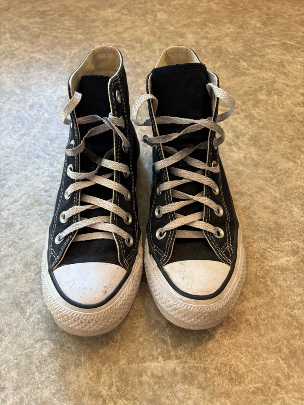 Converse Chuck Taylor’s classic Black and White High-Top Sneakers